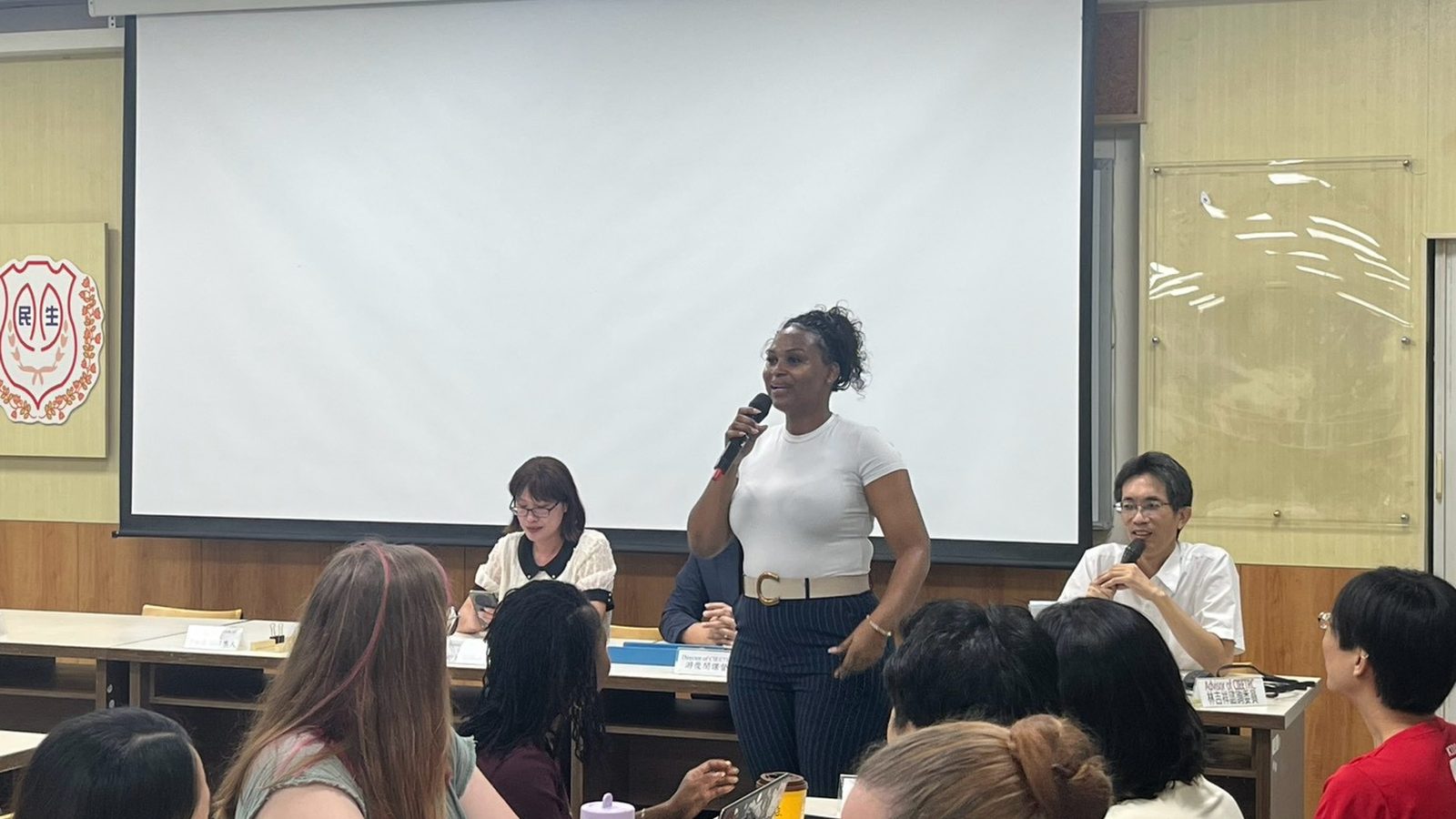A group representative reports back to the room