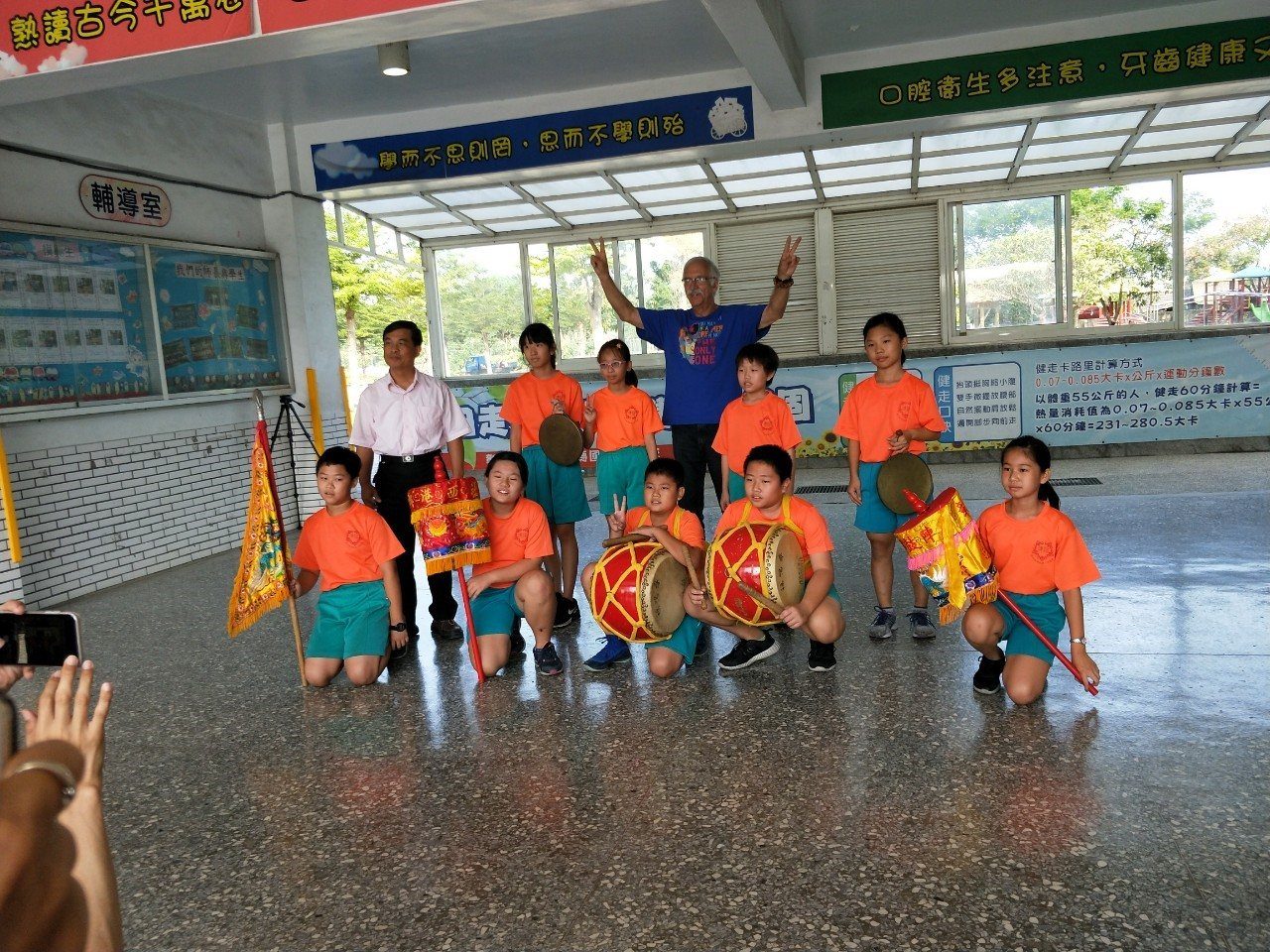With a class and their fan-drum team