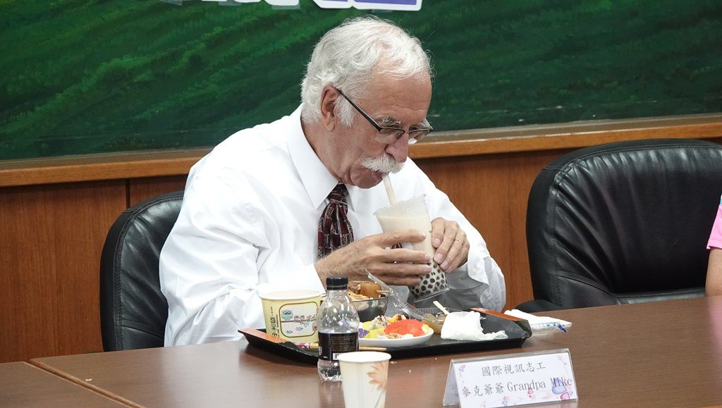 Grandpa Mike tastes the students' favorite local Changhua foods