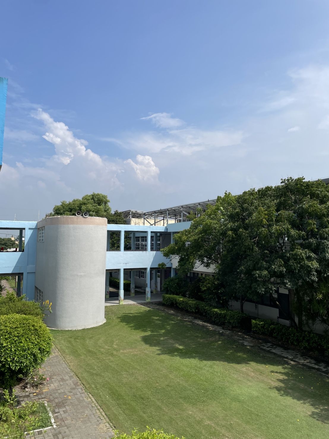 Blue school building courtyard