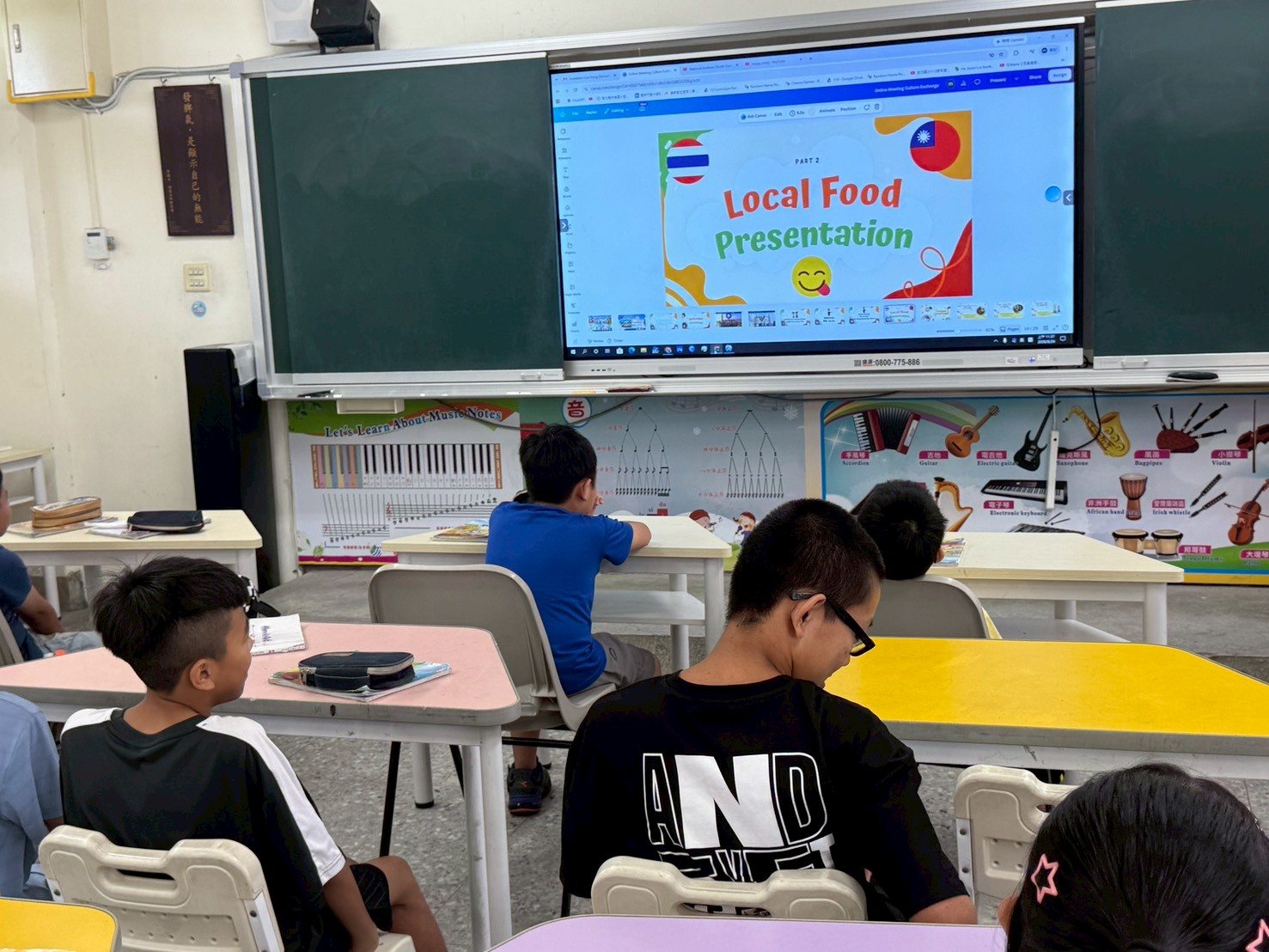 Cundong students watch as Part 2, the Local Food Presentation, begins