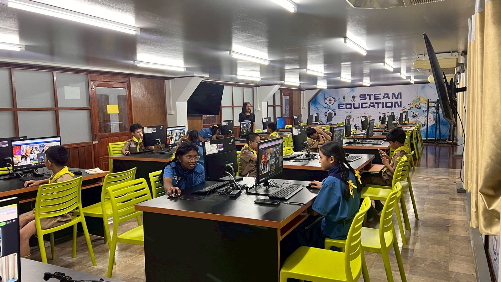 Students at Matheyum Watmai Krongtong School join the call from their school's STEAM Education computer lab