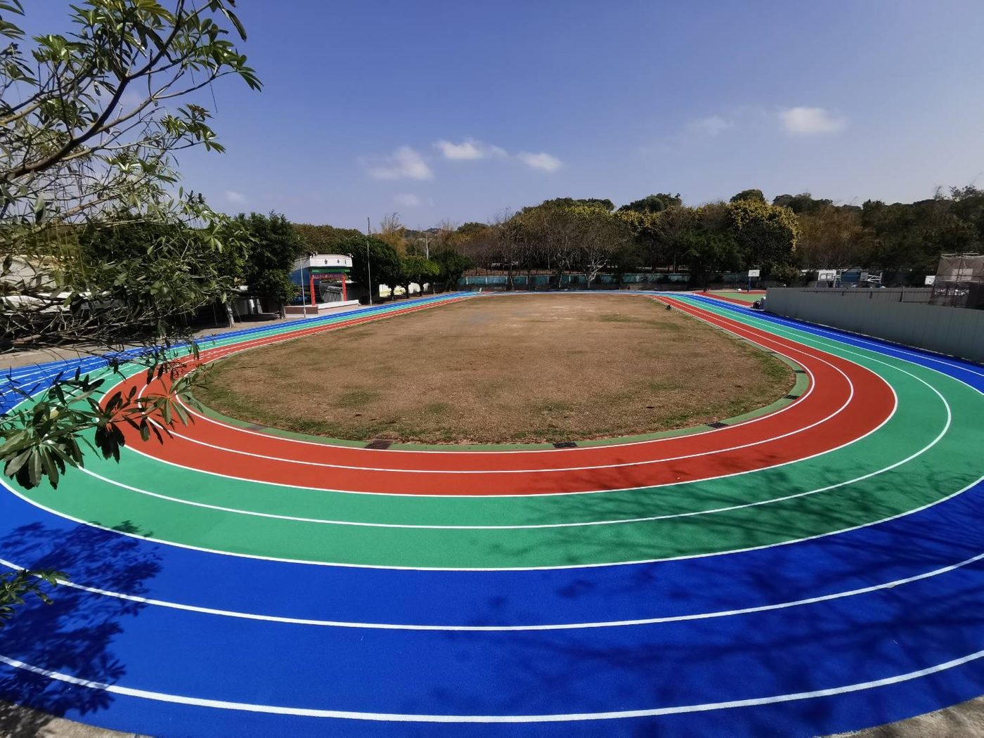 Cundong's vibrant blue-green-red running track
