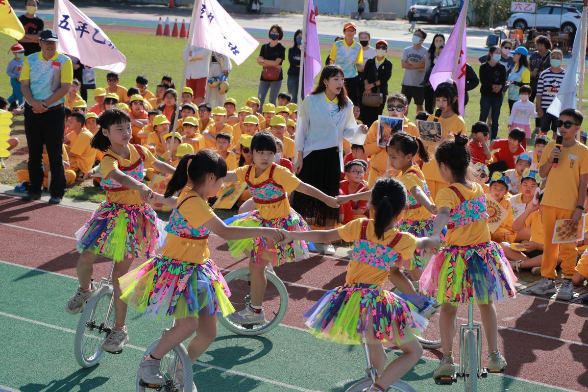 Cundong students performing a unicycle dance routine