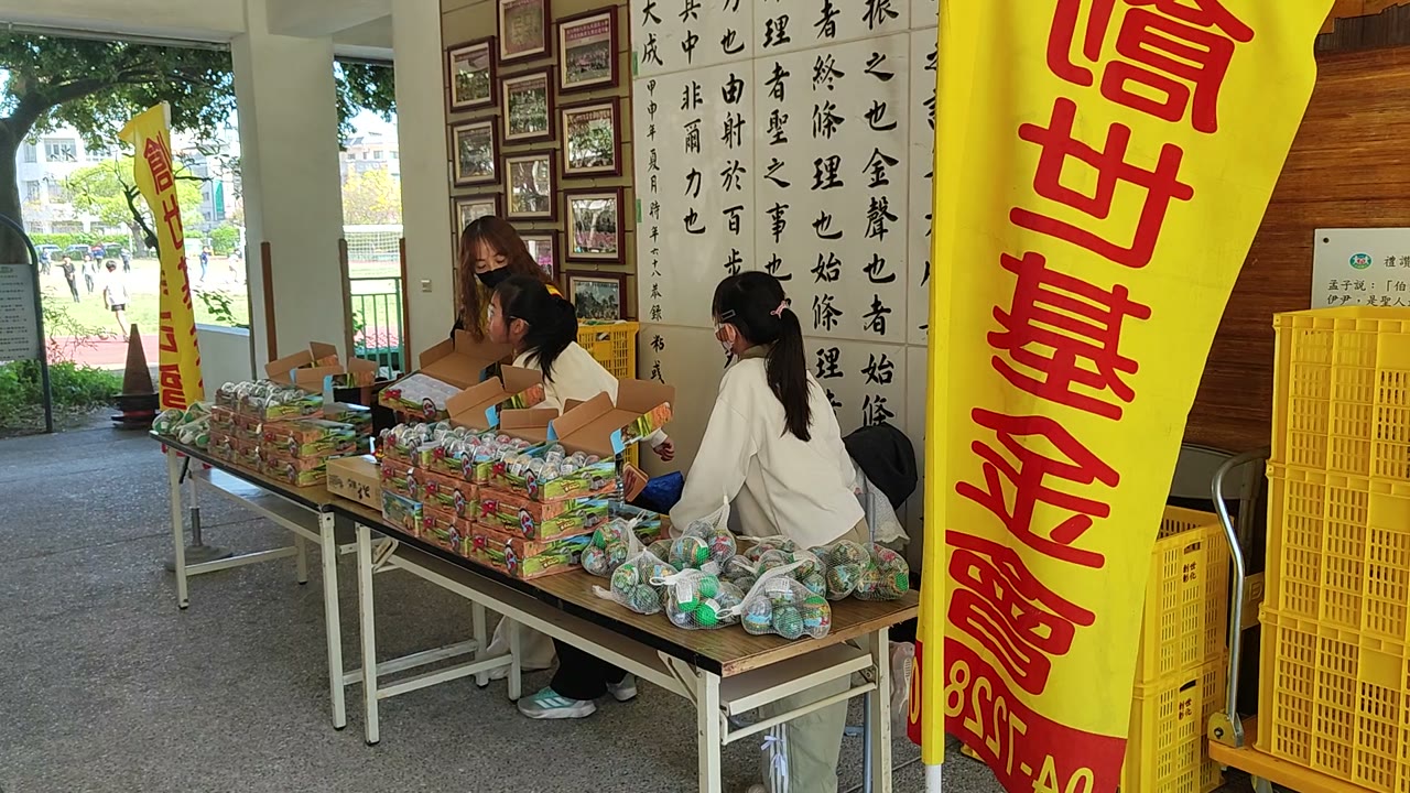 The charity sale table in the school breezeway
