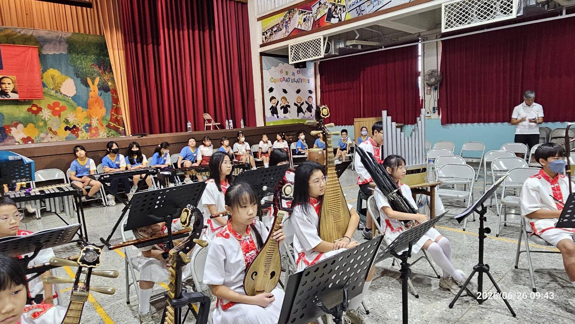 Dingfan's Chinese orchestra performing on stage
