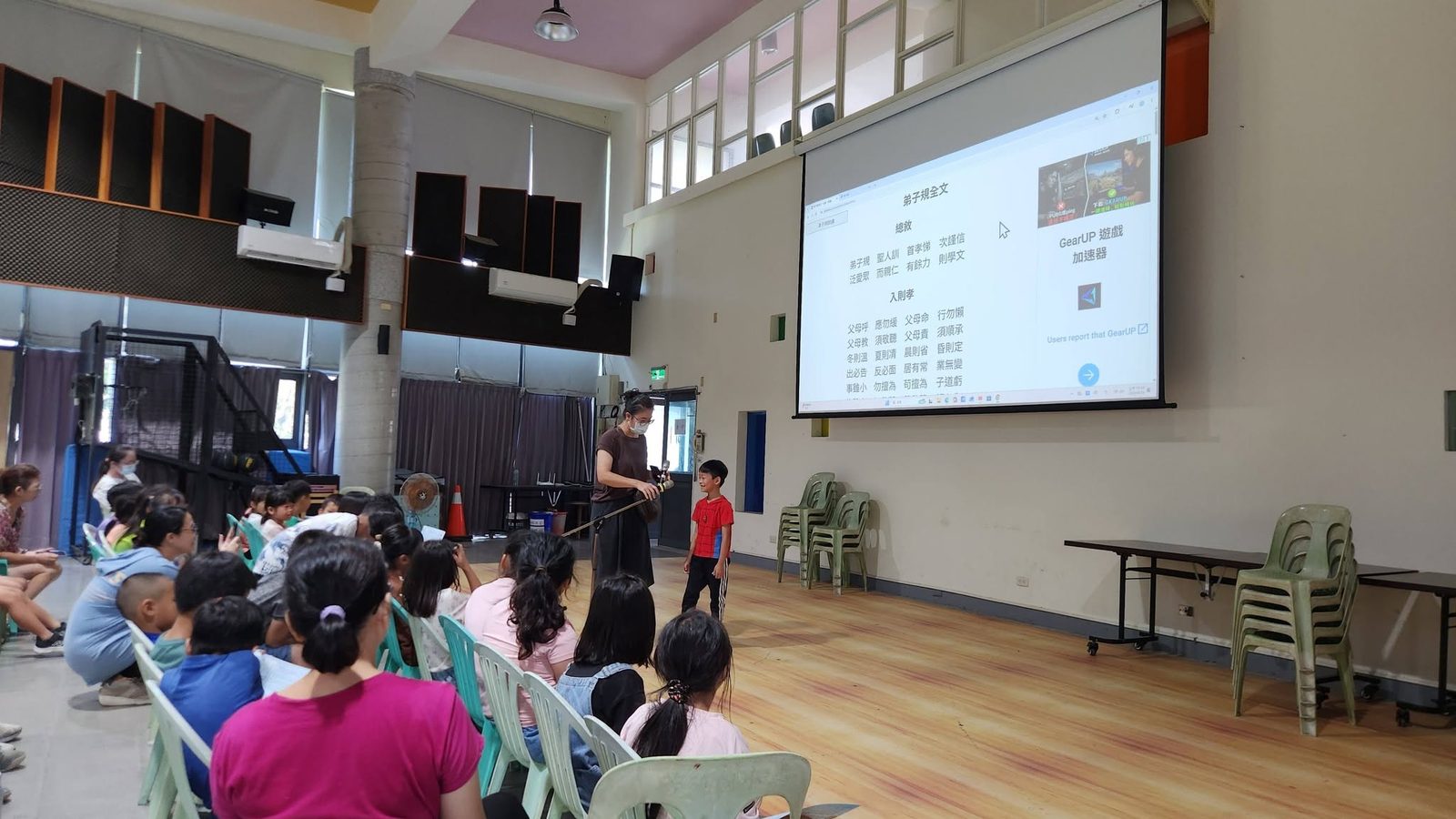 A student reciting Dizi Gui on stage