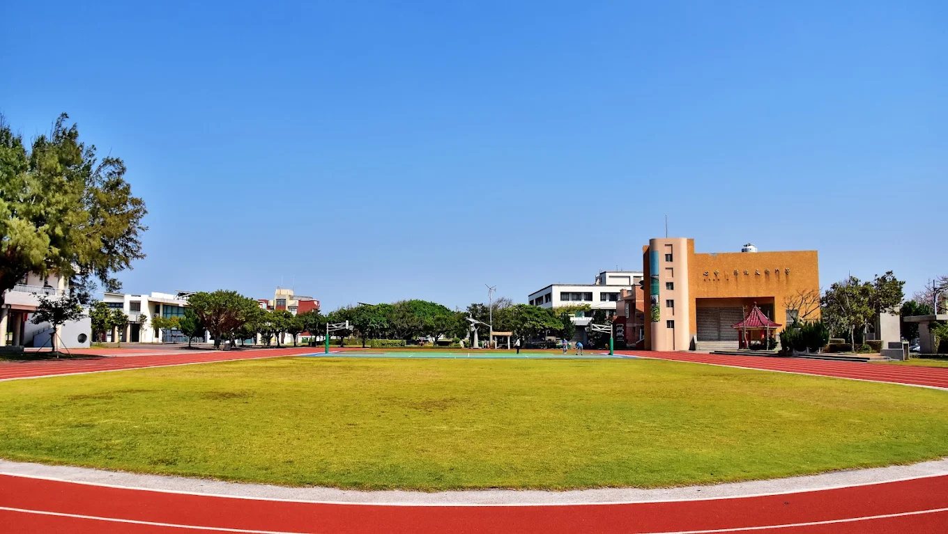Wide view of the school field and track