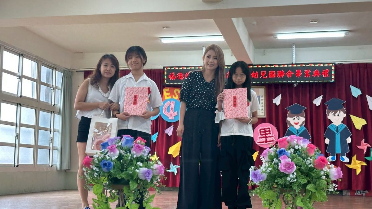 Parents and graduates celebrating together at the ceremony