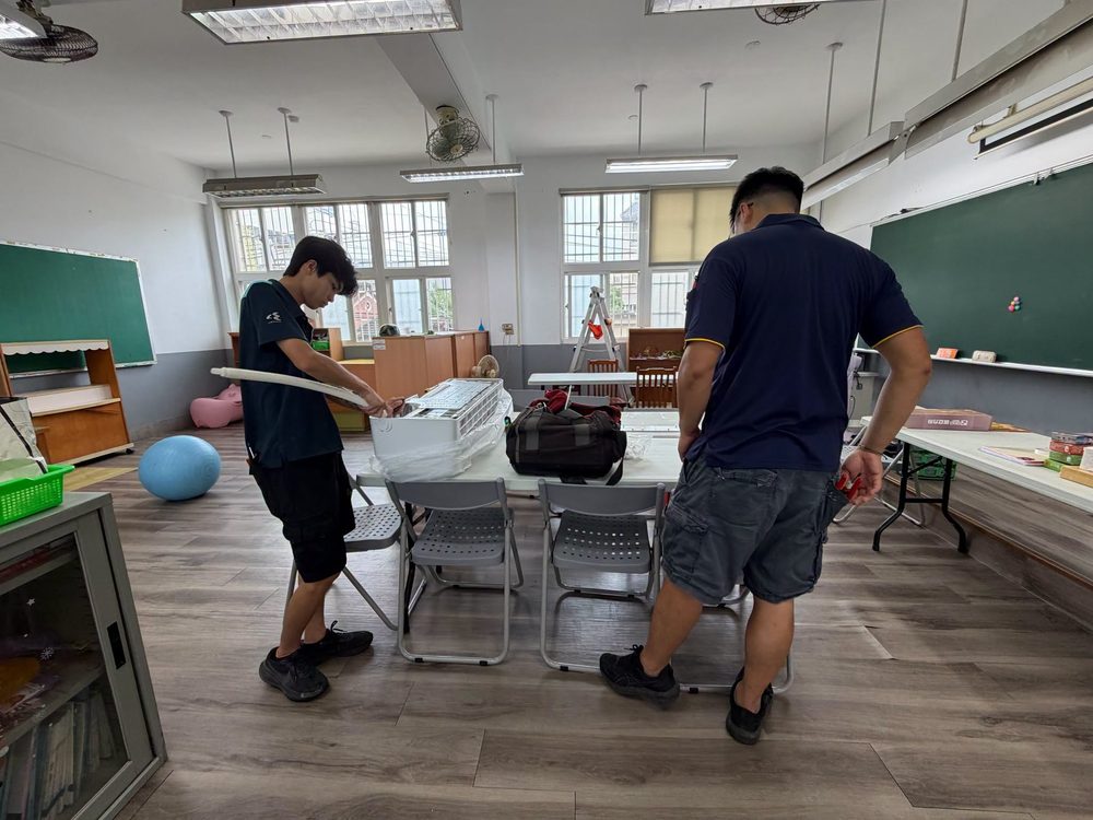 New air conditioners going into a classroom