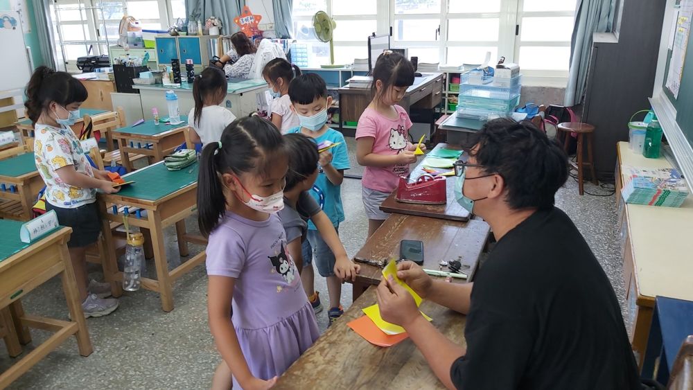 After-school care class doing homework