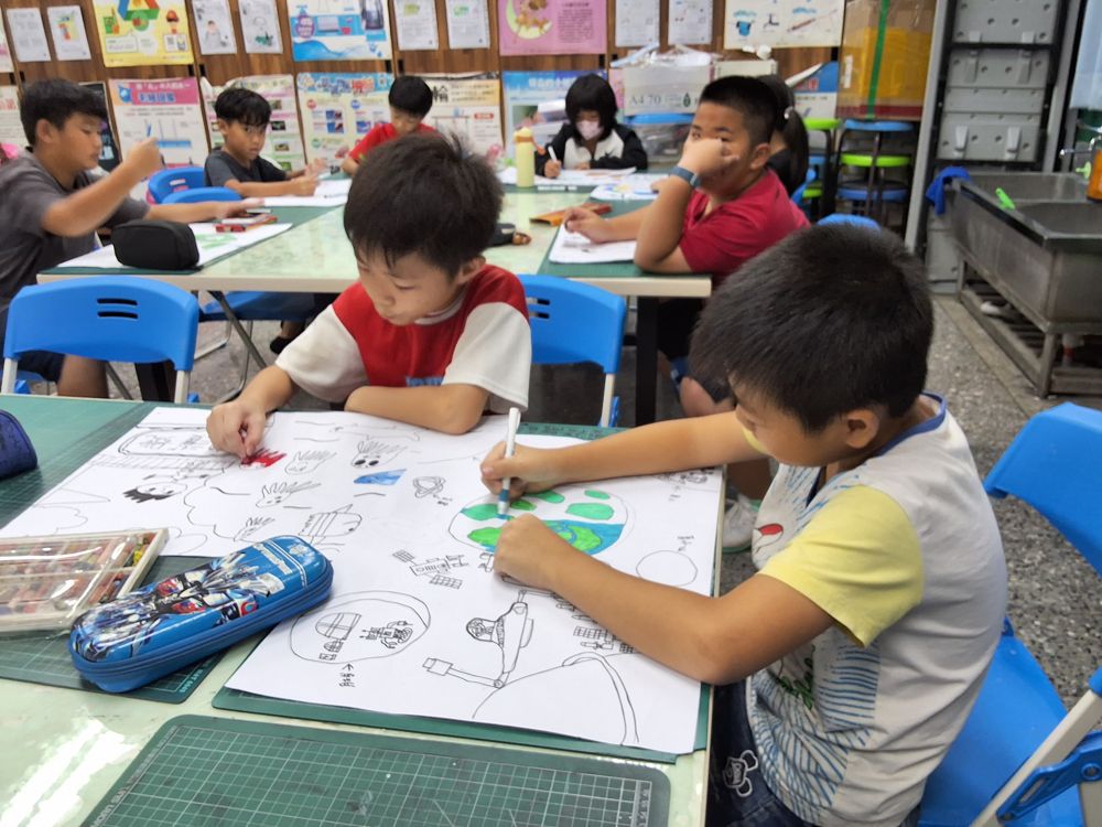 Young artists working on their pictures