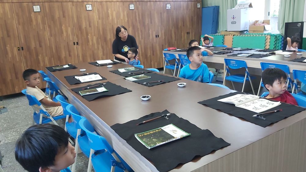 Calligraphy club at work in the classroom