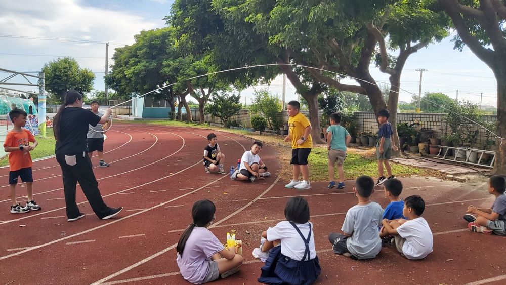 Jump rope club skipping on the school track