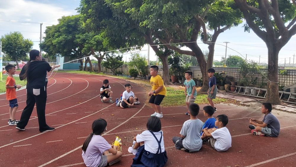 Students practising jump-rope tricks