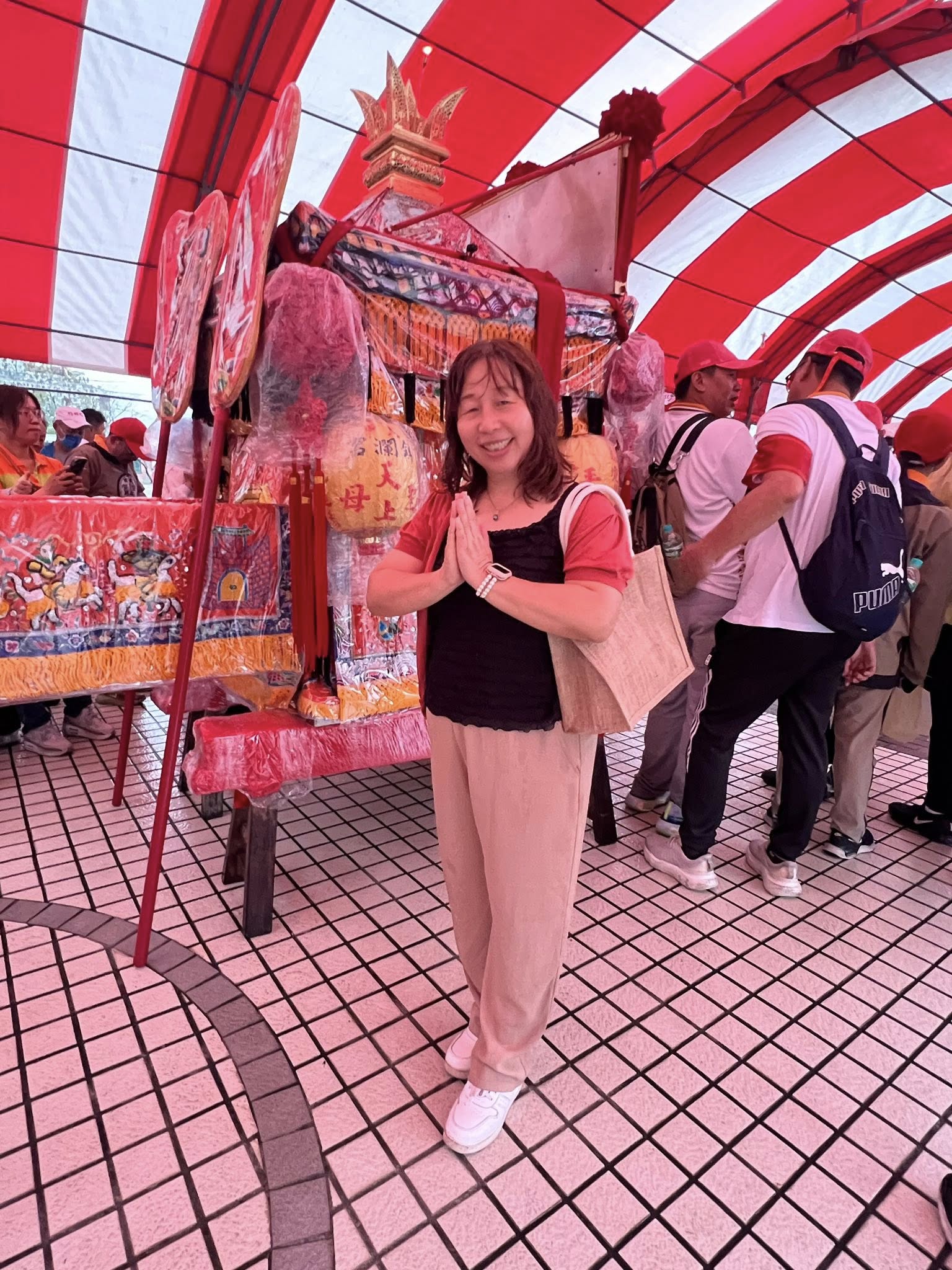 Mazu palanquin passing in front of the school