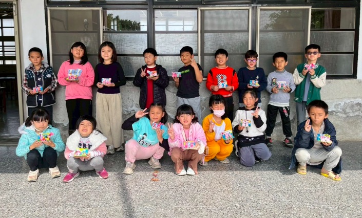 Children making dough zodiac figures
