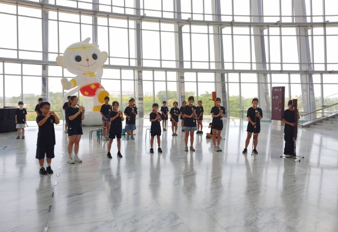 Children performing at the museum