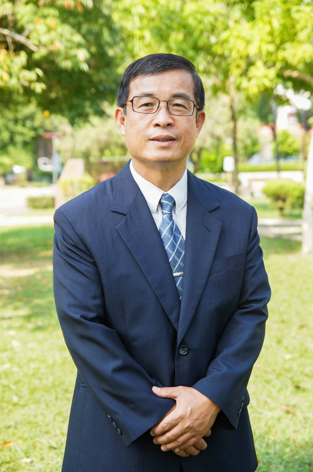 Principal Zhou Xian-zheng 周憲徵校長