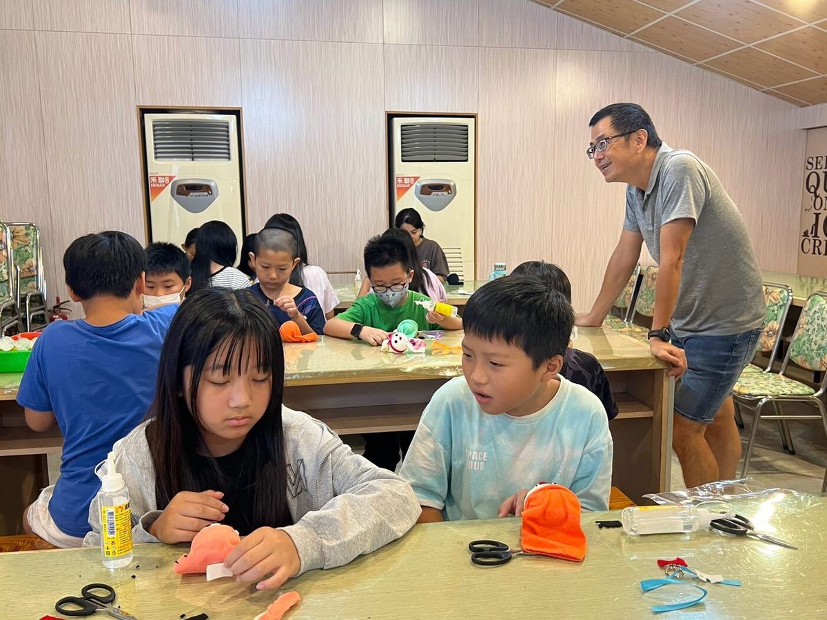 Students making their own sock-doll craft