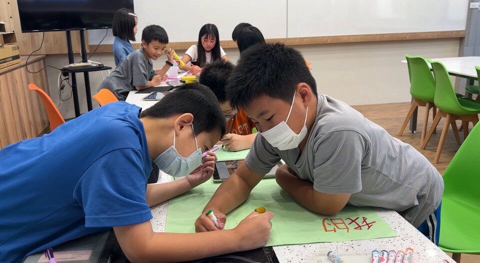 Students working together at their table