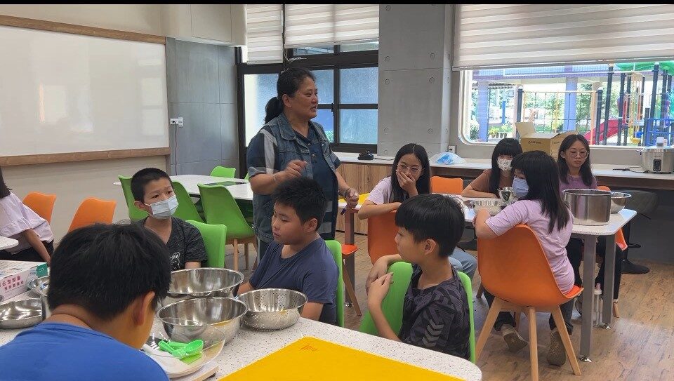 Students making a traditional snack