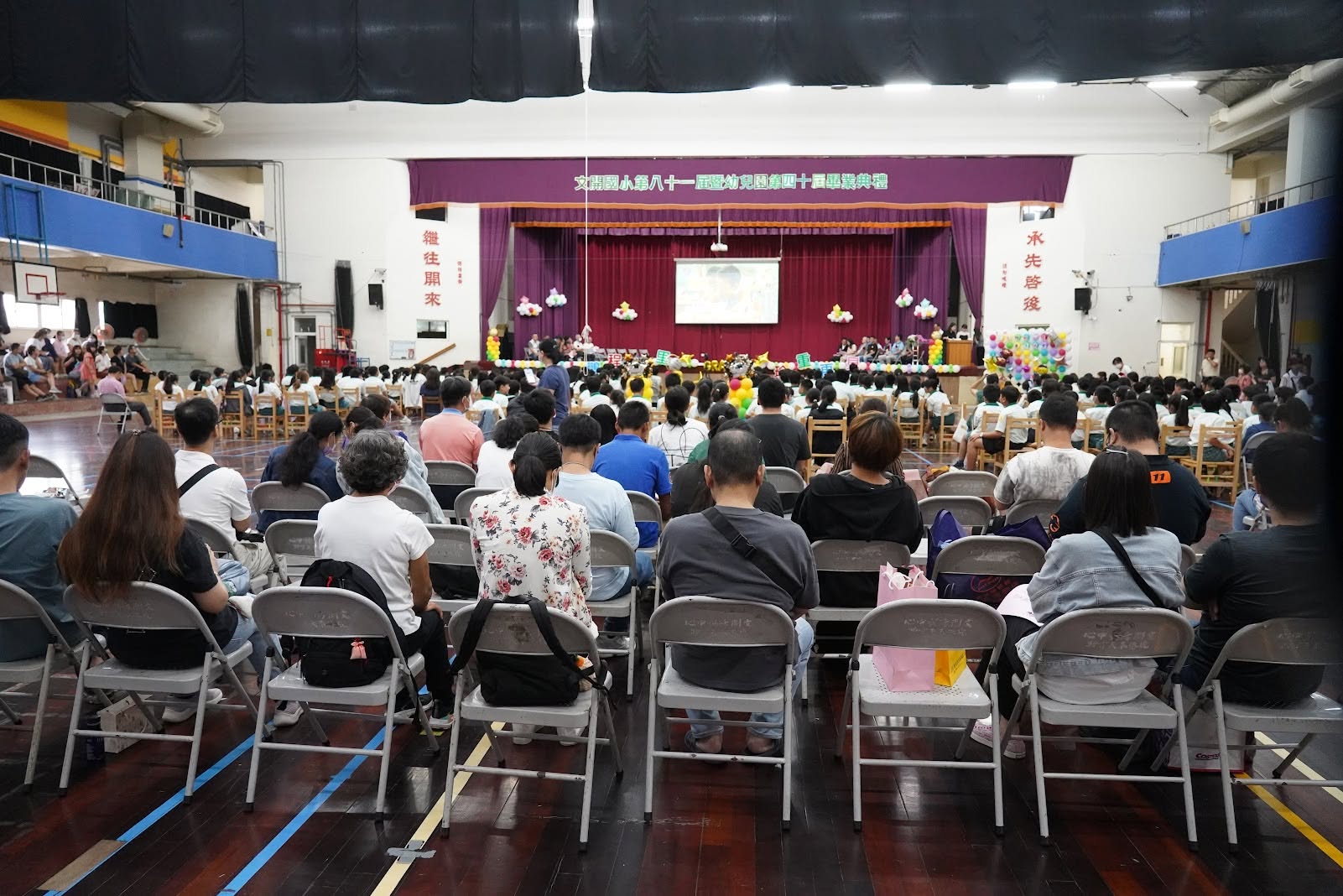 Families and guests seated at the graduation ceremony