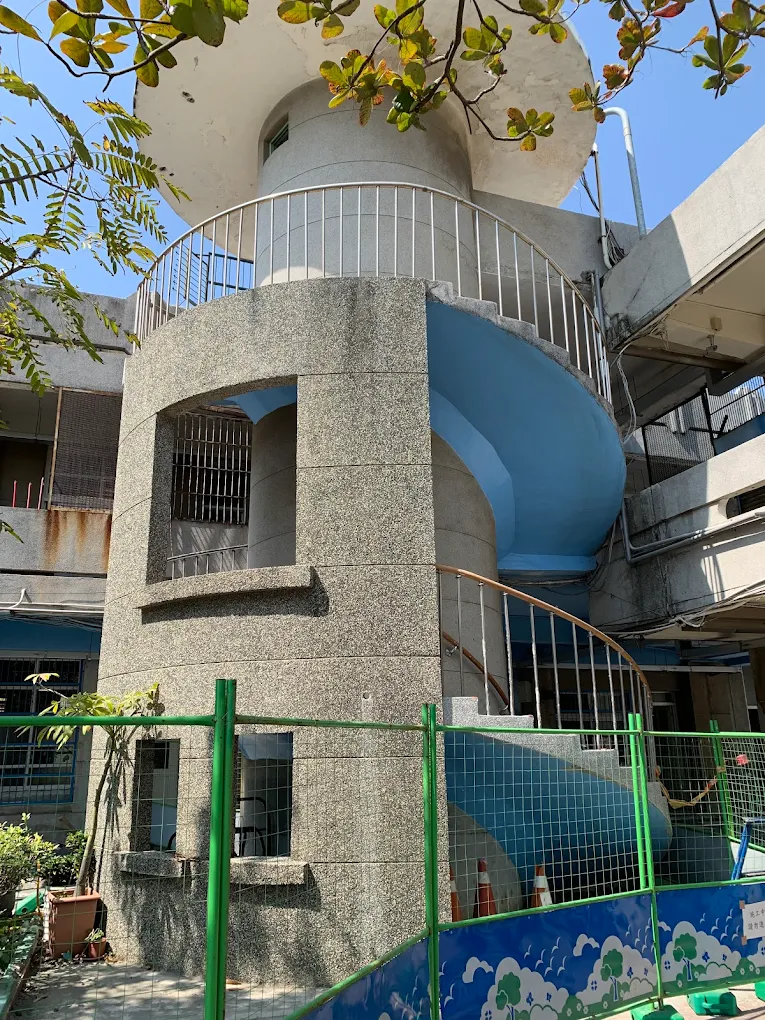 The distinctive spiral-stair tower of Wenkai's historic campus architecture