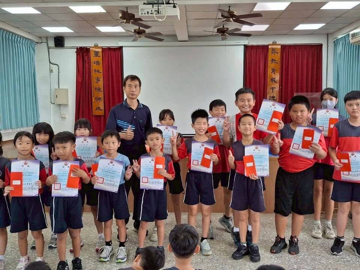 Award winners with their certificates
